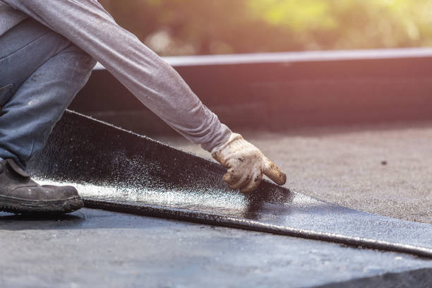 Professional Basement Waterproofing technician working in North Evans, NY